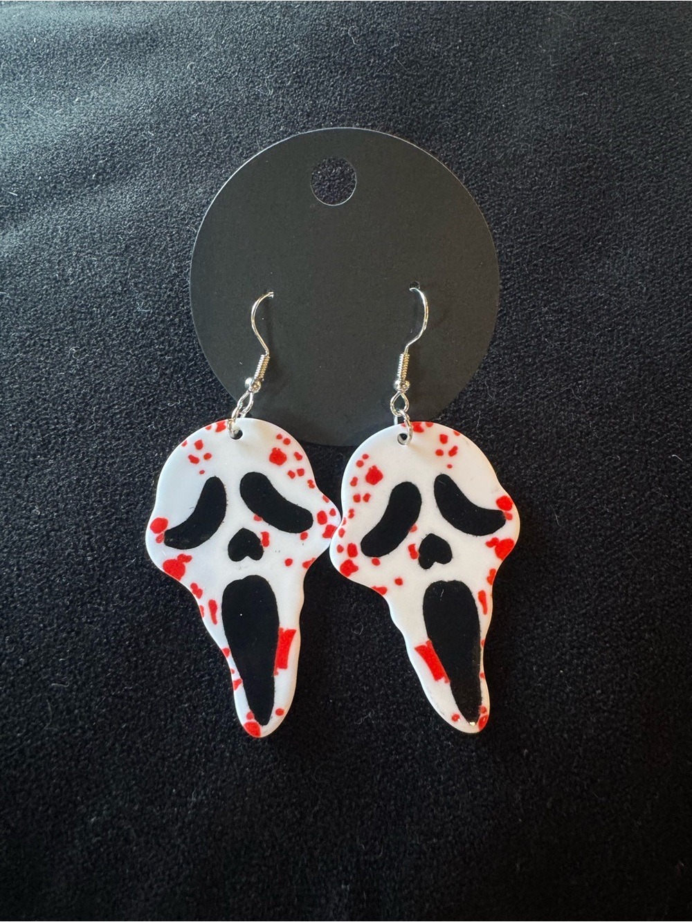White & Black Scream Skull Earrings with Red Accents